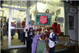 Little Kids Donate to The Salvation Army Bell Ringer Bucket