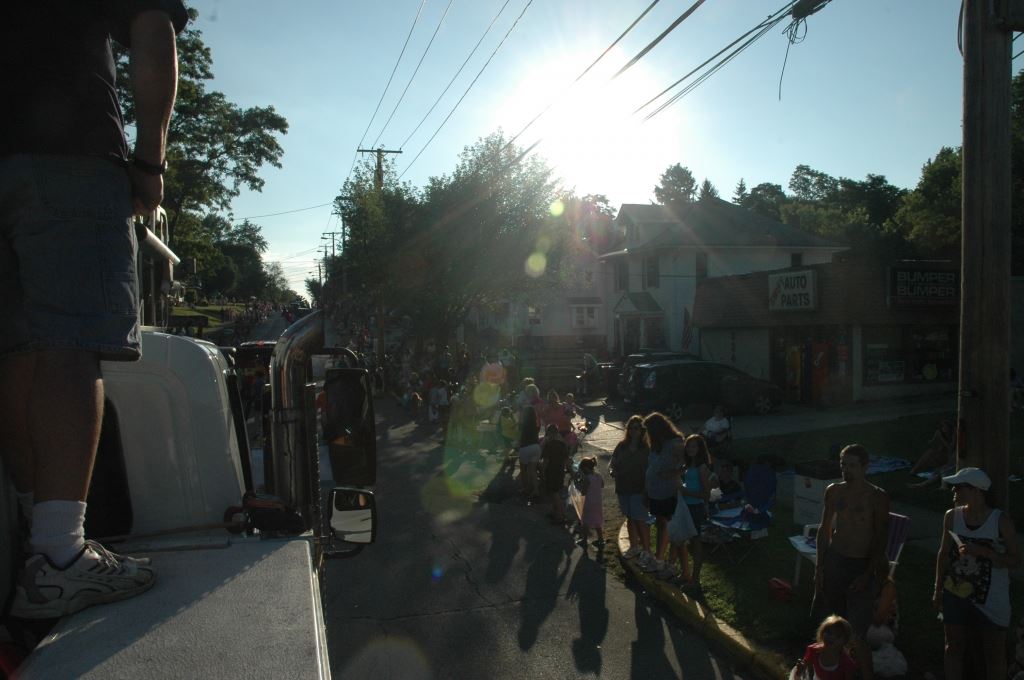Shot of the Crowd from the Back of a Parade Float