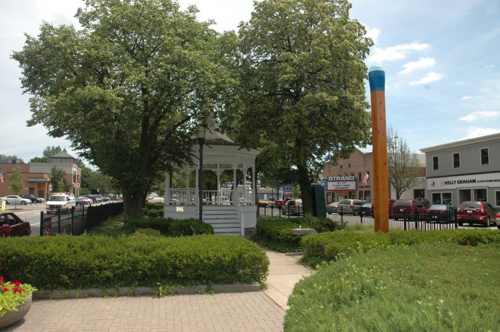 Blue Tip Match Stands High Next to Gazebo
