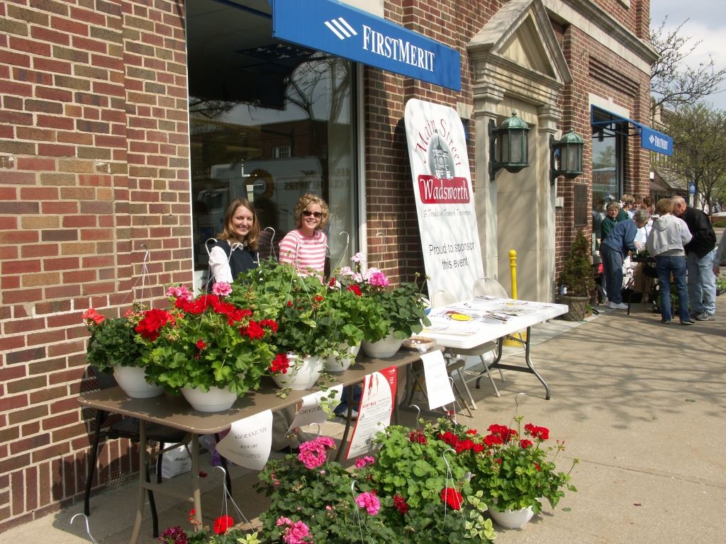 Women Selling Hanging Plants