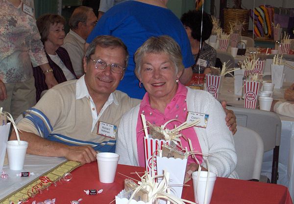 A man and woman at event.